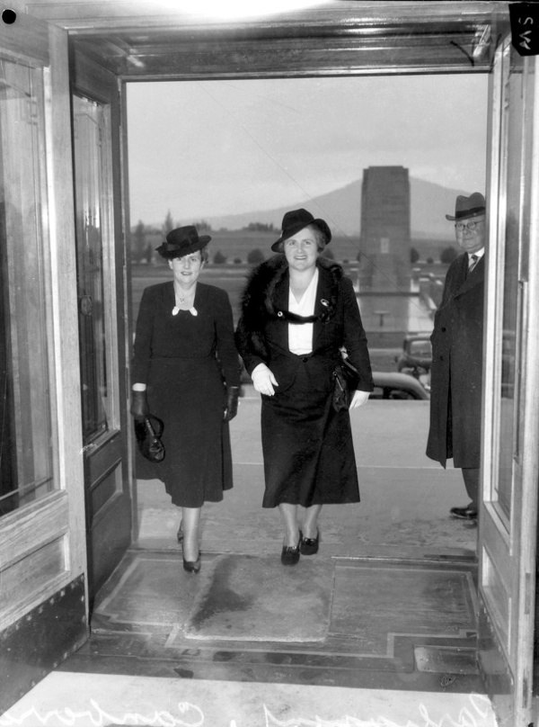 Senator Dorothy Tangney (left) and Dame Enid Lyons, GBE, entering the front door of Parliament House, 1943.